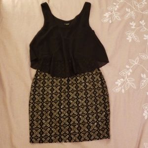 Cute black and gold/glitter dress.